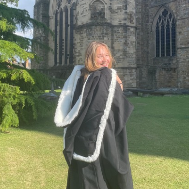 Portrait of Lily in her graduation gown
