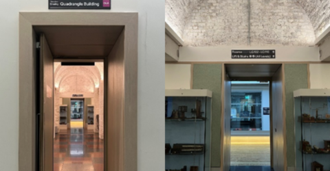 The quadrangle building and macadam building are side by side with signages.