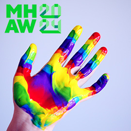 Värikäs käsi, jonka yläpuolella on MHAW 2024 -logo.
