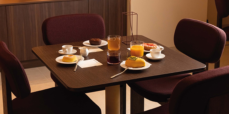 cappellini per alberto magri - table and chairs with food and beverage