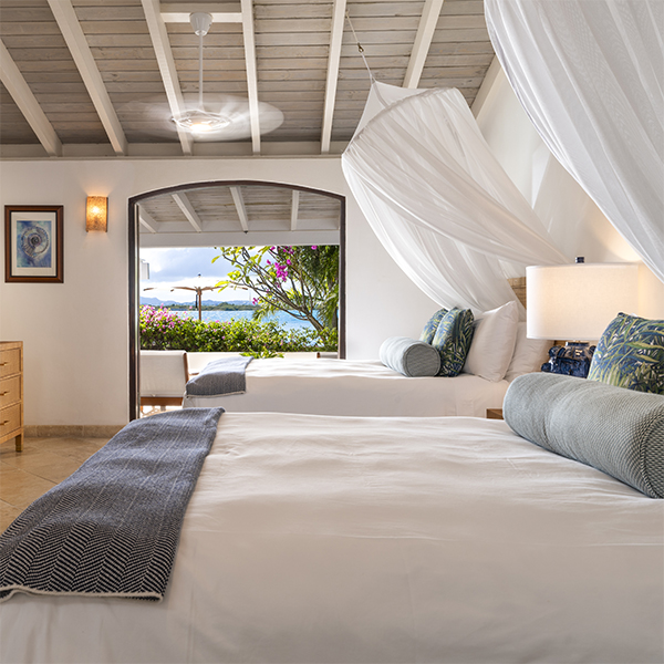 Bedroom in villa with a view of the ocean