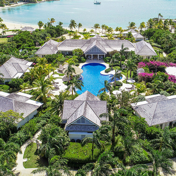 Aerial shot of Private Home highlighting pool and surrounding bay