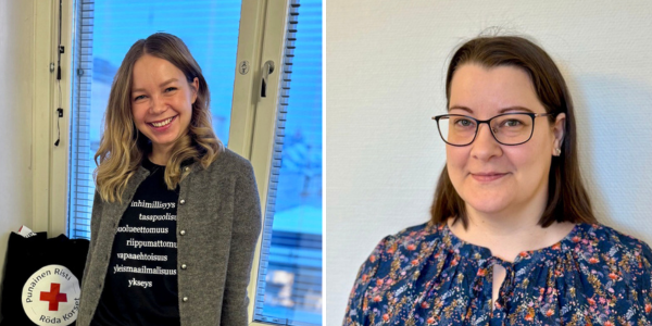 Kaksi hymyilevää henkilöä