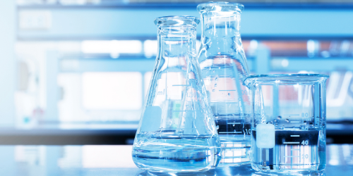 flasks in a light laboratory setting